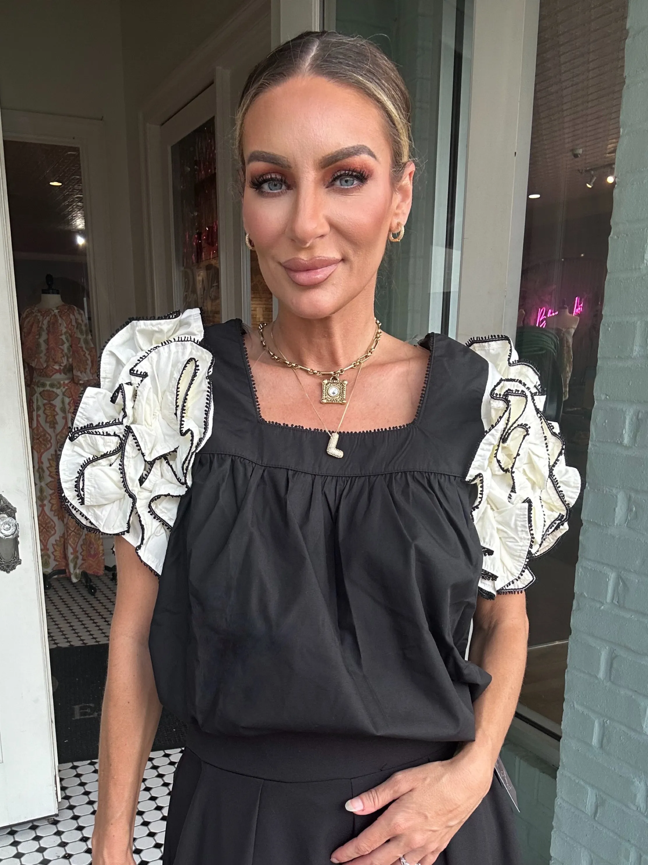 Embur Bouse With White Ruffled Sleeves