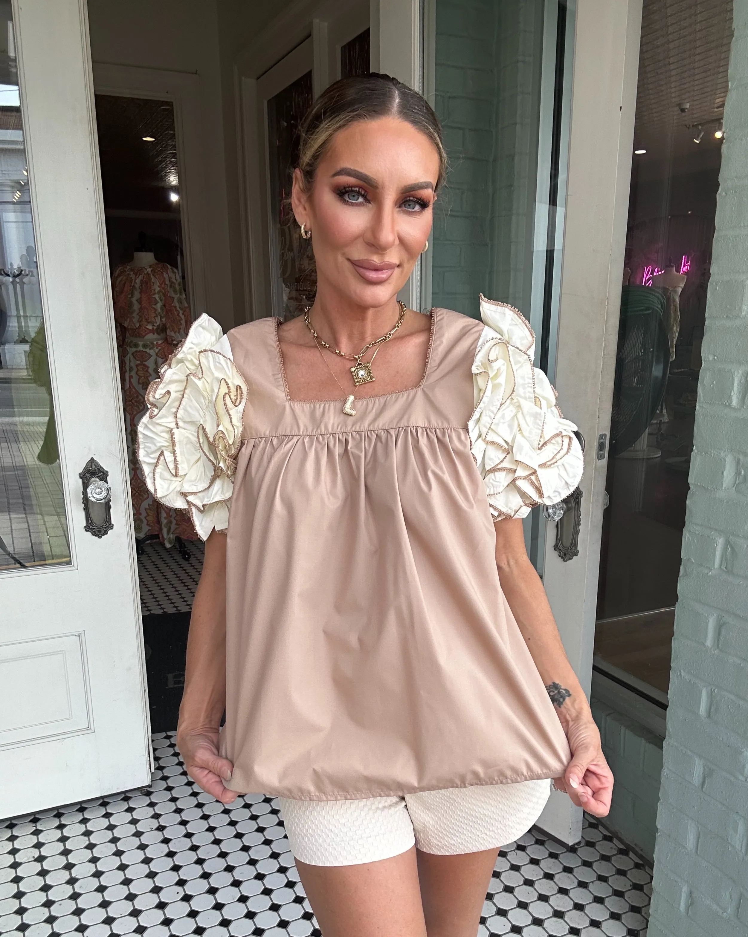 Embur Bouse With White Ruffled Sleeves