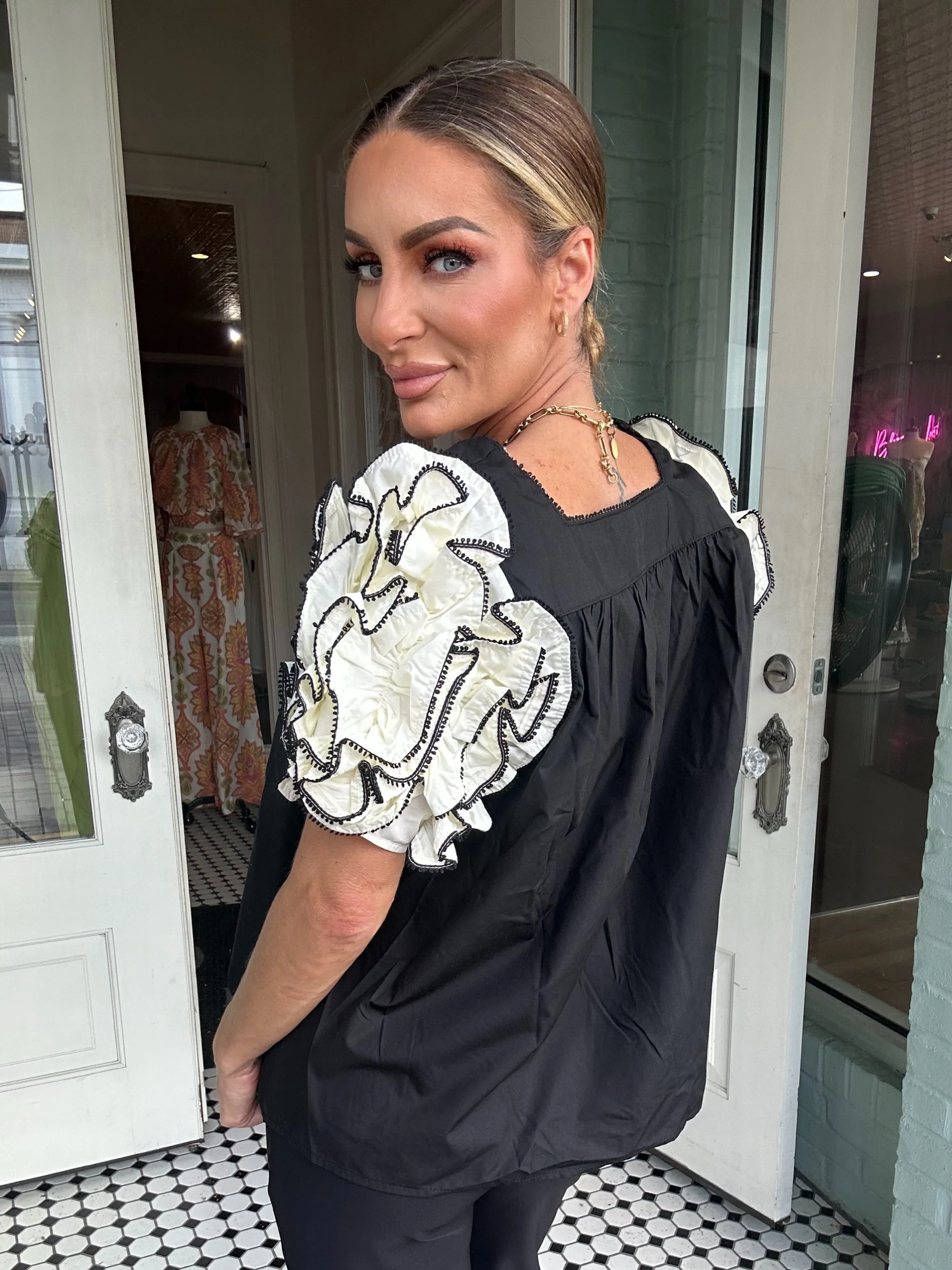 Embur Bouse With White Ruffled Sleeves